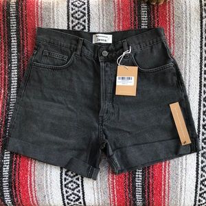 Reformation mid rise relaxed Jean shorts in Seine.